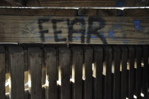 Board with word FEAR painted